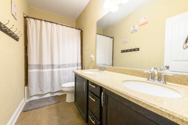 Building Photo - Spacious 4BR/2BA Energy Star Certified Hom...