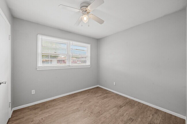 Building Photo - Updated Home with Gorgeous Floors & Large Backyard