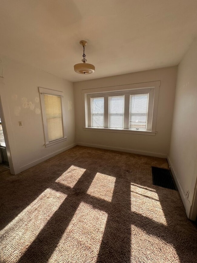 Building Photo - Charming 1.5-Story Home available for RENT beginning January 2, 2025.