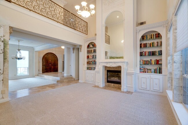 Building Photo - "Stately Gated 5-Bedroom Estate With Pool, Custom Details & Abundant Living Space!"