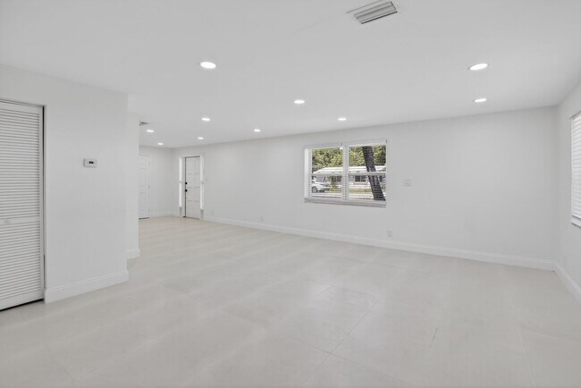 Building Photo - Renovated 3BR/2BA Corner Single-Family Home – Large Fenced Yard, NO HOA