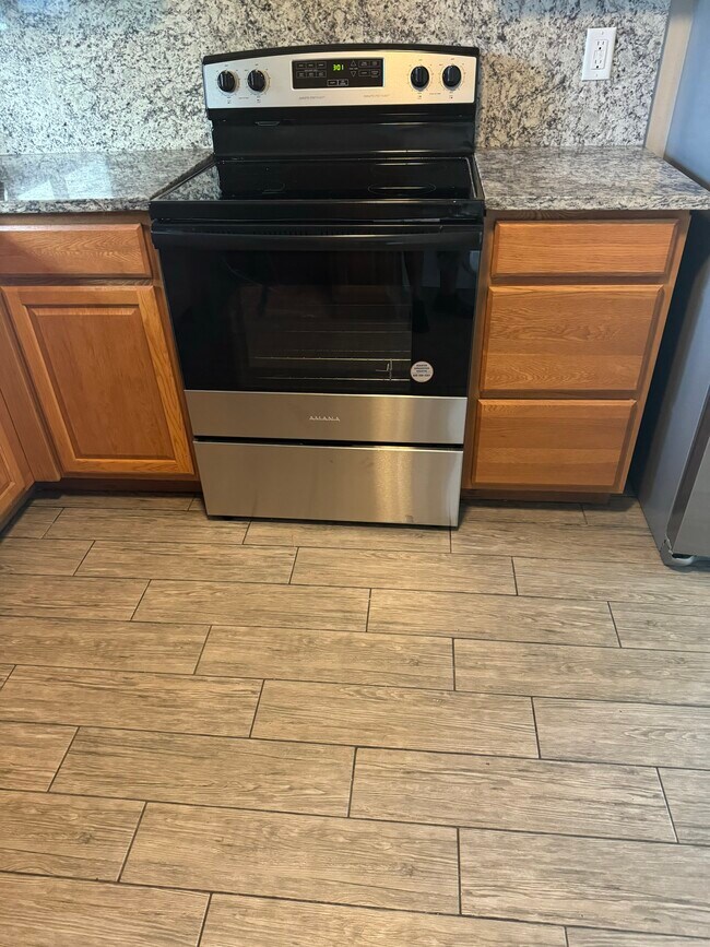 Building Photo - 1612 SE Cascella Ct