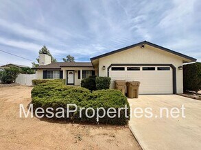 Building Photo - 7891 Corona Ave