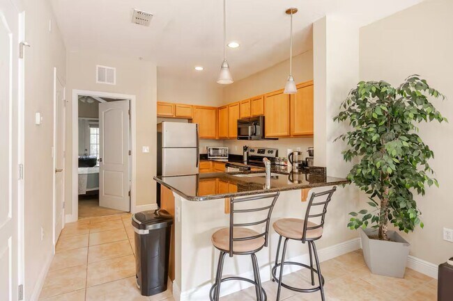 Building Photo - Fully Furnished 3-Bedroom/3-Bath Townhome