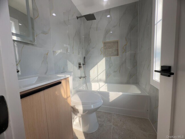 Building Photo - 214-31 39th Ave