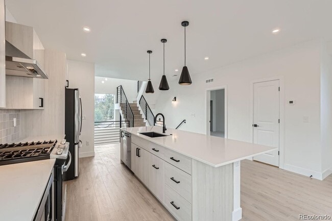 Building Photo - New Construction 3-Bedroom Townhome with Rooftop Deck & Mountain Views