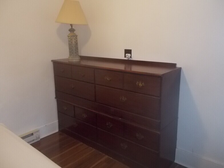 Bedroom with dresser on west wall - 924 E Main St