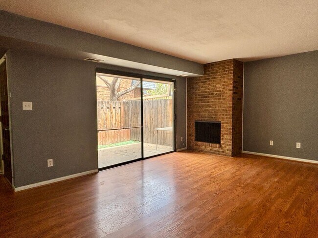 Building Photo - Large, Lovely 2BD/1.5BA Townhouse-Style Condo — Steps from Highline Canal!