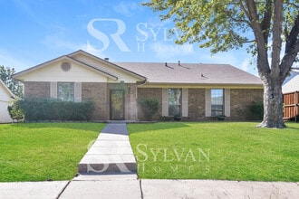 Building Photo - Enjoy living the good life in this 3 bedroom, 2 bathroom brick home