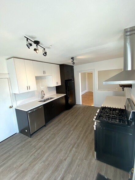 Updated Kitchen. Stainless Steel Fridge on the way. - 618 Adams Street NE