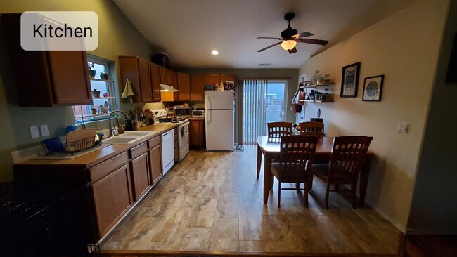 Building Photo - Charming 3 Bed, 2 Bath House with 2 Car Garage, Fenced Backyard and Central AC!