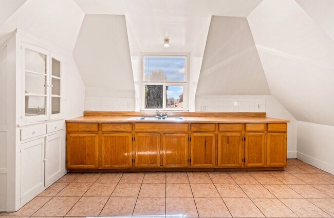 Building Photo - Utilities Included! 3 Bedrooms with Bonus Room & Spacious Kitchen