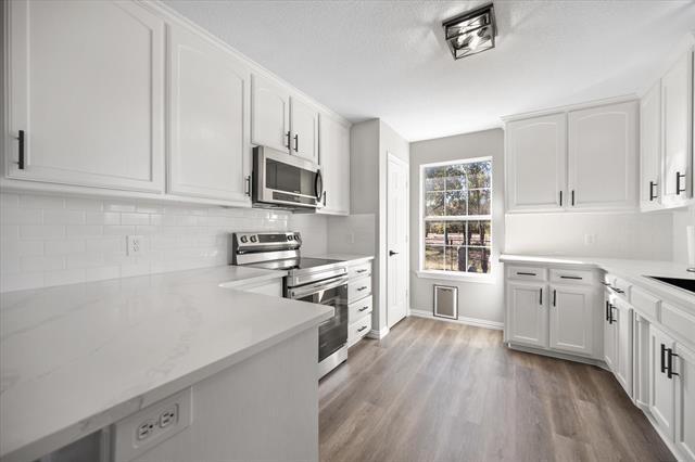 Building Photo - 1301 County Rd 705