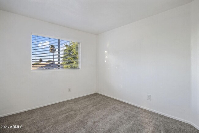 Building Photo - 9326 E Pampa Ave