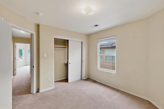 Building Photo - 9000 Violet Orchid Tr SW