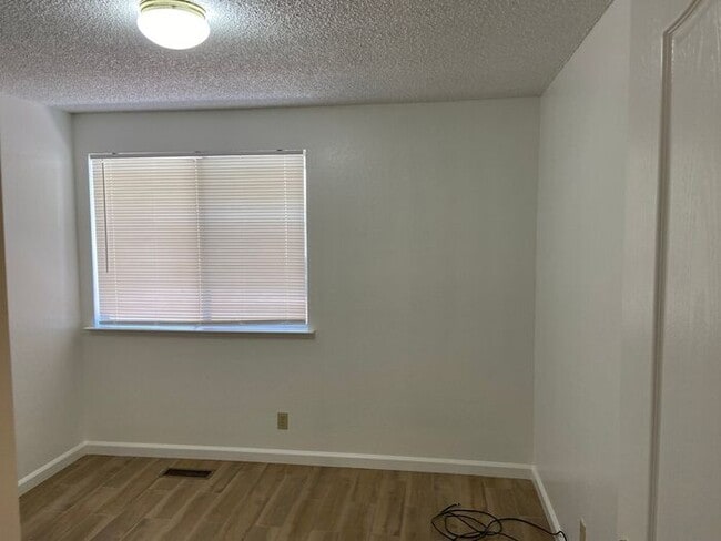 Building Photo - Coming Up Roses - NW Reno 4 Bedroom/3 Car Garage Single Story House