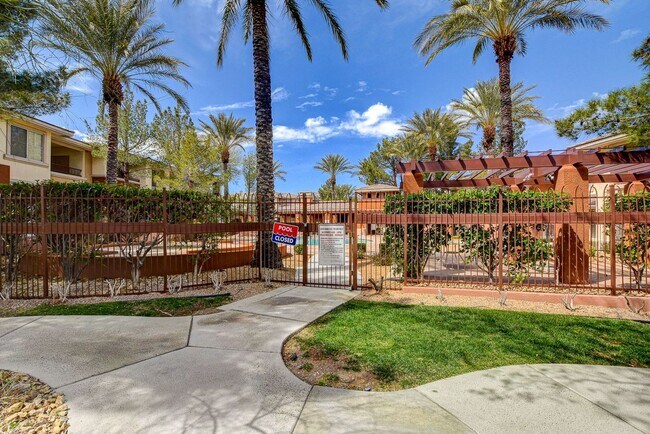 Building Photo - Upgraded First-Floor Condo in a Gated Summ...