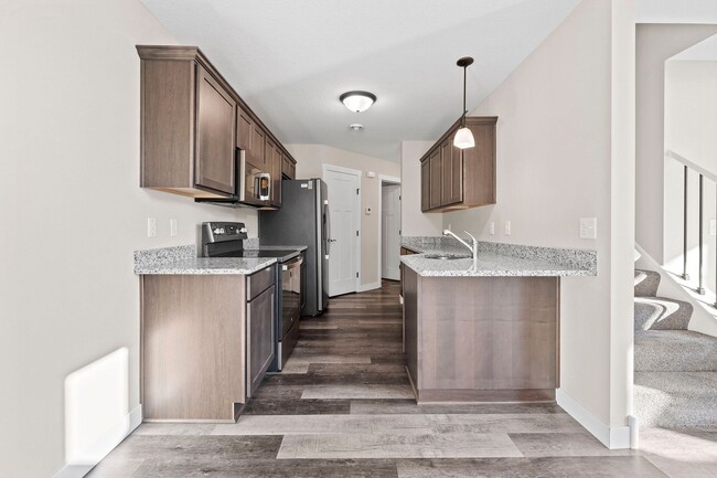 Building Photo - New 3 Bedroom Townhome