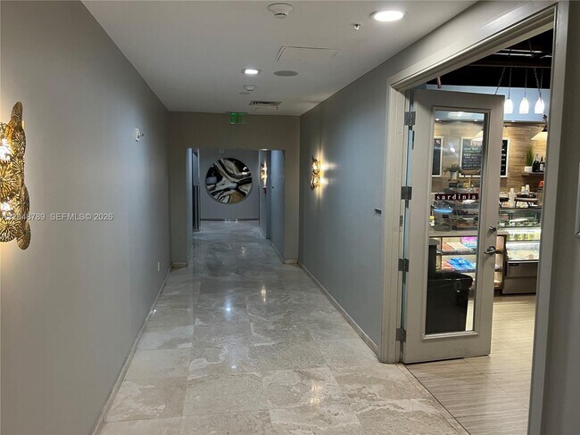 Building Photo - 10275 Collins Ave