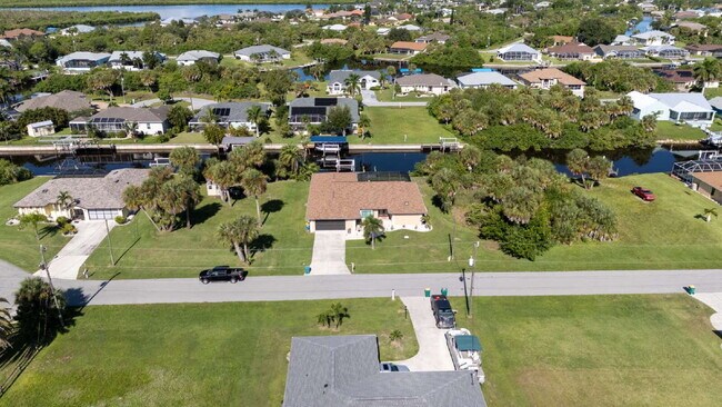 Building Photo - 3 BEDROOM • 2 BATHROOM • PRIVATE POOL • WATERFRONT • BOAT LIFT • ZERO DEPOSIT MOVE-IN AVAILABLE