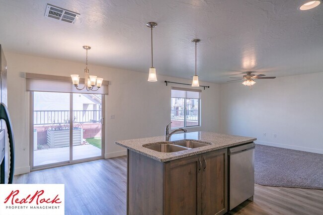 Building Photo - Adorable Stand Alone 4 Bedroom Corner Unit with Fully Fenced Backyard. Small Dogs Welcome.