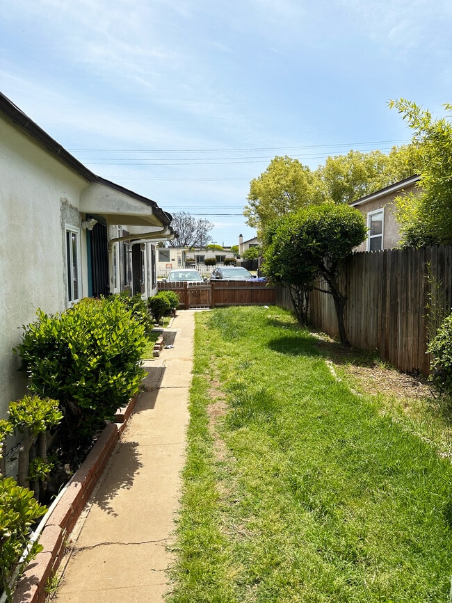 Take leisurely strolls or enjoy peaceful moments in the home's outdoor space - 1738 Dahlia Ave