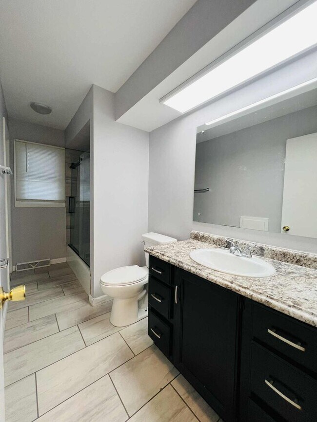 Building Photo - Spacious 4-Bedroom Home with Finished Basement & Attached Garage