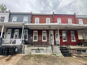 Building Photo - Stunning 3-Bedroom Townhome in Carroll Park! Available NOW!