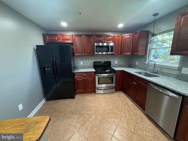 Building Photo - 8216 Dellwood Ct