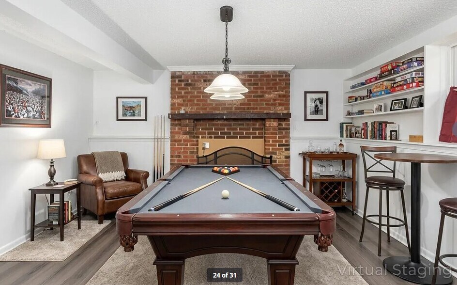 lower den staged - 8435 Othello Pl