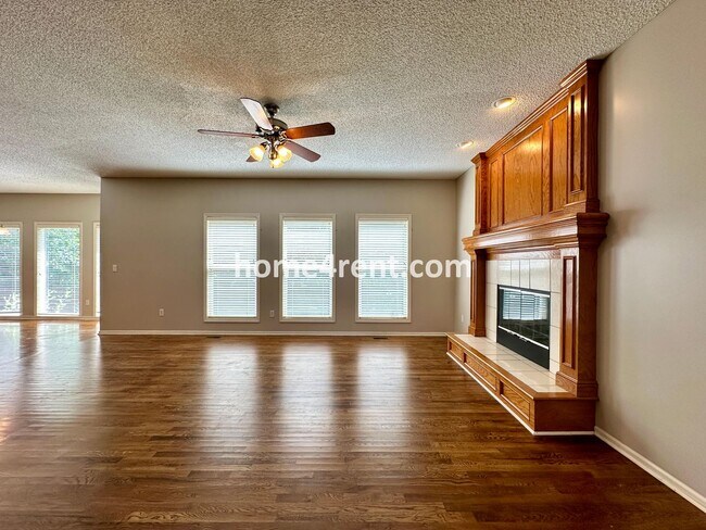 Building Photo - Beautiful Four-Bedroom Home with Three Car...
