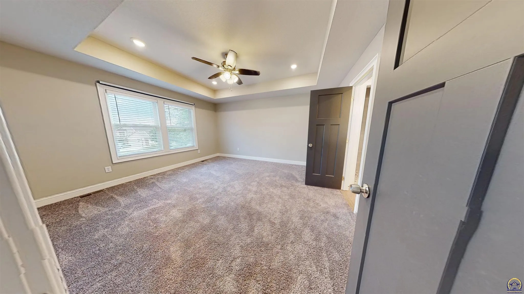 Primary Bedroom with coffered ceiling - 3755 SW Summerfield Dr