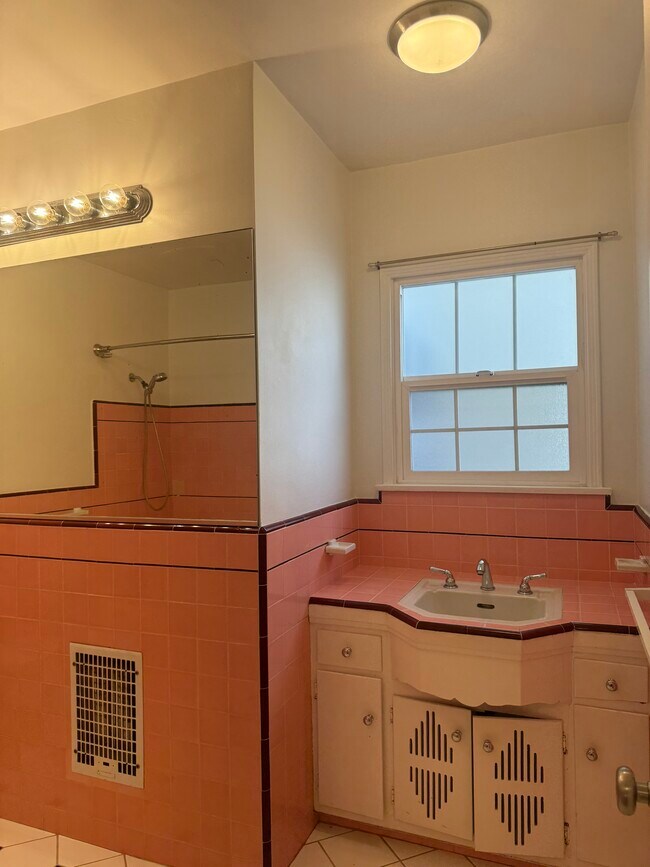 Bright tile bathroom with retro sink/vanity - 8618 McConnell Ave