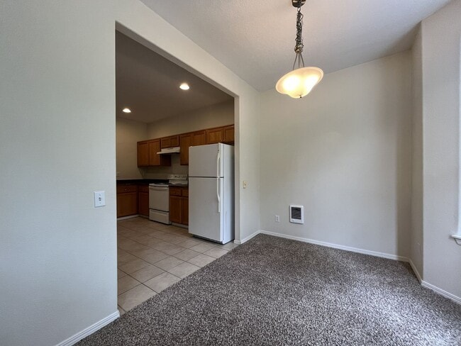 Building Photo - Spacious Three-Story Townhome Near Orenco Station with Attached Garage, Private Balcony, and Vaul...