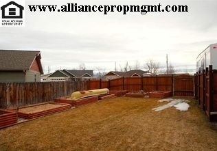 Building Photo - Centrally-located 3 bedroom home with paved RV parking.