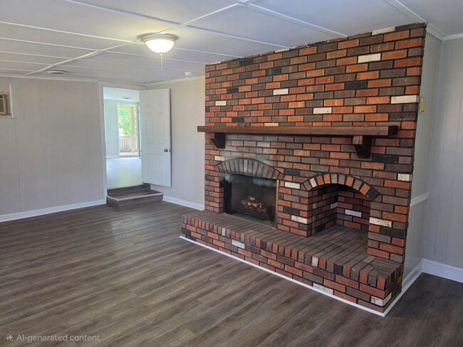 Building Photo - 3 bedroom 1.5 bath with 2-car garage