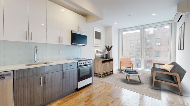 Building Photo - 138-28 Queens Blvd