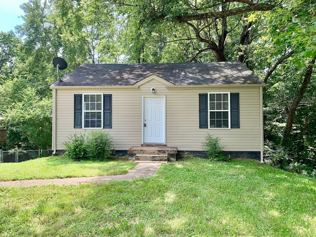 Primary Photo - Cozy 2-Bedroom Home with Spacious Yard?Pet...