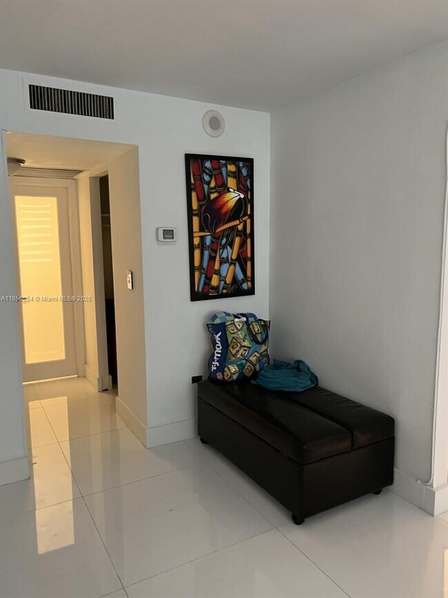 Building Photo - 5555 Collins Ave