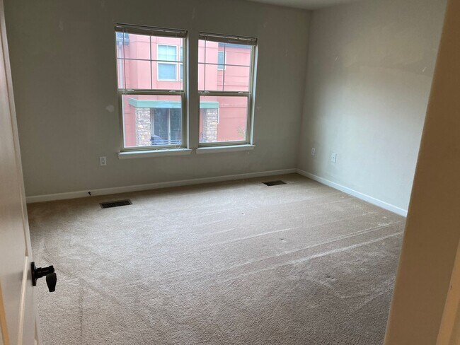 Building Photo - Large garage with attached spacious 2 bedroom townhome