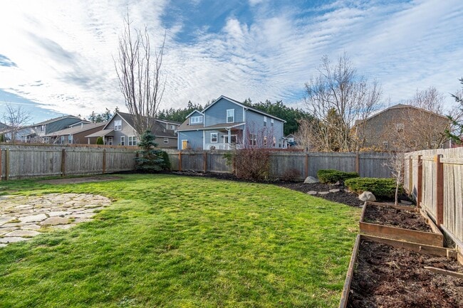 Building Photo - Spacious 3 Bedroom Plus Office with AC, Gas Fireplace and Fenced Backyard