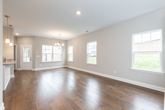 Building Photo - **BE THE LUCKY ONE TO LIVE IN THIS 2022-BUILT UPSCALE COTTAGE HOME IN THE PRESERVE AT BELLE POINTE**