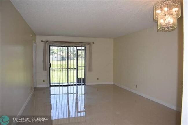 Building Photo - 9431 Boca Cove Cir