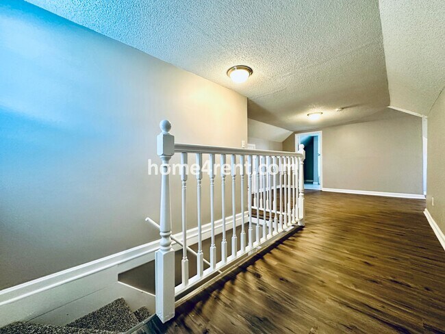 Building Photo - Adorable Home Featuring Wood Floors, SS Ap...