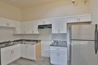 Building Photo - 1548 E 26th Ave