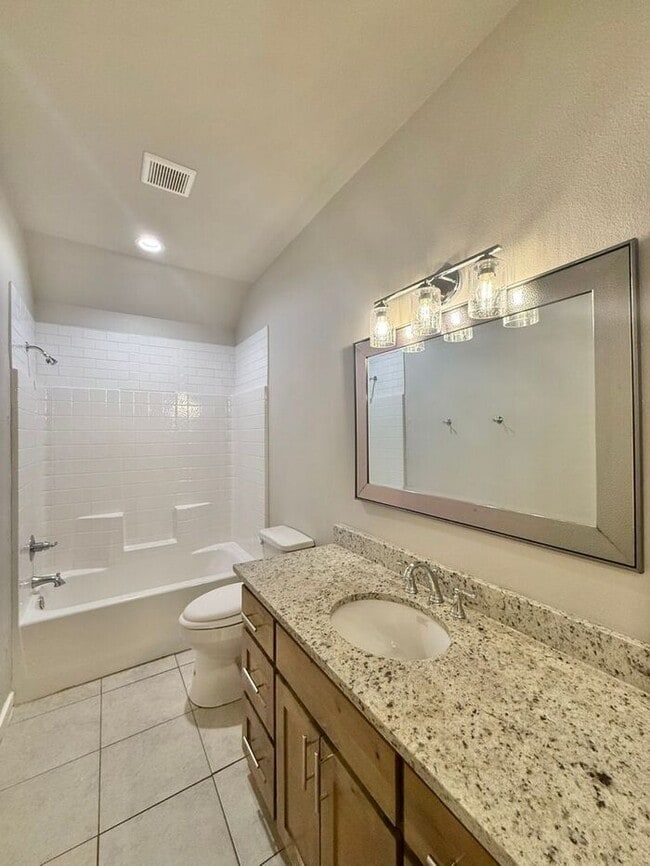 Building Photo - Tour Today: Charming 1-Story 4 Bedroom Home with Modern Comforts!