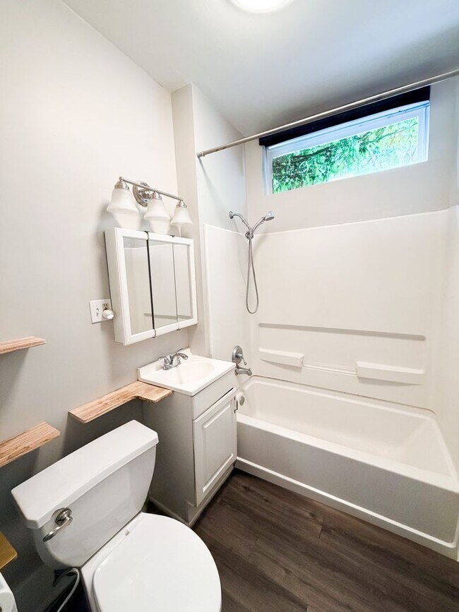 Building Photo - COMING SOON! 2b 1.5 ba w basement, Lawn Care + Trash Included