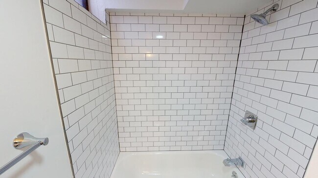 Building Photo - Renovated Park Hill brick home with large backyard