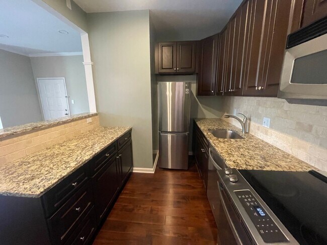 Building Photo - Dupont Circle 2-level Condo at The Cygnet. 1 Bed/1 Full Bath, Fireplace and Modern Kitchen