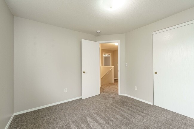 Building Photo - A/C Equipped 4 Bedroom 2.5 Bath Located in...